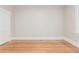 Spacious bedroom with hardwood floors and neutral color scheme at 618 Milwaukee St, Denver, CO 80206