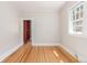 Bedroom with hardwood floors and a closet at 618 Milwaukee St, Denver, CO 80206