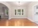 Inviting dining area with large windows and hardwood floors at 618 Milwaukee St, Denver, CO 80206