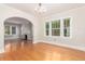 Charming living room with hardwood floors, fireplace, and sunlit windows at 618 Milwaukee St, Denver, CO 80206