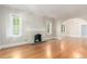 Open-concept living room with hardwood floors and abundant natural light at 618 Milwaukee St, Denver, CO 80206
