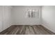 Spacious bedroom featuring wood-look floors and built-in shelving at 2725 W 86Th Ave # 5, Westminster, CO 80031