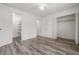 Bright bedroom with wood-look floors, and ample closet space at 2725 W 86Th Ave # 5, Westminster, CO 80031