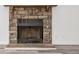 Close-up view of a stone fireplace in a living room at 2725 W 86Th Ave # 5, Westminster, CO 80031