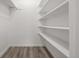 Walk-in closet with built-in shelving at 2725 W 86Th Ave # 5, Westminster, CO 80031