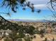 Panoramic view of mountain range and neighborhood from the property at 7367 S Himalaya Way, Centennial, CO 80016