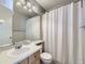 Simple bathroom with a shower/tub combo, toilet, and vanity at 11701 Bent Oaks St, Parker, CO 80138