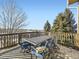 Deck with an outdoor dining set and picturesque views at 11701 Bent Oaks St, Parker, CO 80138