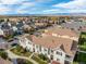 Aerial view of houses and townhouses with mountain views in the background at 1536 Sepia Ave, Longmont, CO 80501