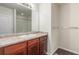 Bathroom boasts a vanity with granite countertop at 1536 Sepia Ave, Longmont, CO 80501