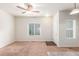 Bright living room with entryway and windows at 1536 Sepia Ave, Longmont, CO 80501