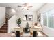 Living room with L-shaped sofa and two accent chairs at 1536 Sepia Ave, Longmont, CO 80501