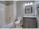 A clean bathroom with a tub and shower combination and a modern vanity at 12218 S Oak Bluff Trl, Parker, CO 80134