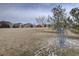 Community park featuring disc golf basket, large grassy area and neighborhood homes in the background at 12218 S Oak Bluff Trl, Parker, CO 80134