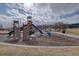 Community playground offering colorful play structures, swings and a picnic area for outdoor Gathering fun at 12218 S Oak Bluff Trl, Parker, CO 80134