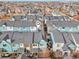 Overhead view of colorful homes in a planned community, with roofs clearly visible at 2212 Tamarac St, Denver, CO 80238