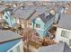 Aerial view of a residential area showcasing well-maintained homes, green spaces, and a tranquil neighborhood setting at 2212 Tamarac St, Denver, CO 80238