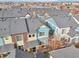 Beautiful aerial view showcasing colorful homes with well-maintained roofs in a vibrant community at 2212 Tamarac St, Denver, CO 80238