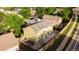 An elevated view showcasing the home's backyard and two-story design within a residential neighborhood at 7627 Halleys Dr, Littleton, CO 80125