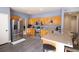 Kitchen features wood cabinets, stainless steel appliances, granite countertops, and views to the backyard at 7627 Halleys Dr, Littleton, CO 80125