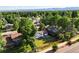 Charming home nestled in a lush, green neighborhood with mountain views at 9591 W Florida Pl, Lakewood, CO 80232