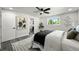 Stylish bedroom featuring a modern design with neutral tones and chic decor elements at 9591 W Florida Pl, Lakewood, CO 80232