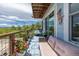 Cozy balcony with comfy seating and plants offering great views and relaxation space at 6260 Everett Ct # D, Arvada, CO 80004