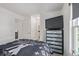 Comfortable bedroom featuring a large dresser and decor at 6260 Everett Ct # D, Arvada, CO 80004