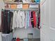 Walk-in closet with ample storage space, hanging rods, and shelving for organizing clothes and accessories at 6260 Everett Ct # D, Arvada, CO 80004