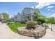 Attractive home with a well-manicured lawn, rock bed and landscaping at 6260 Everett Ct # D, Arvada, CO 80004