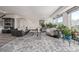 Bright living room featuring modern decor, sleek furnishings, and lots of natural light at 6260 Everett Ct # D, Arvada, CO 80004