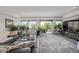 Living room boasting lots of natural light and an open layout with contemporary decor at 6260 Everett Ct # D, Arvada, CO 80004