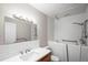 Bathroom with walk-in tub, updated vanity, and subway tile backsplash at 495 S Dayton St # 1D, Denver, CO 80247