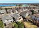 A beautiful aerial view of lakeside houses showcasing the neighborhood's charming architecture and scenic surroundings at 5541 S Eaton St, Littleton, CO 80123