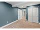 Bedroom with new carpet and paint, offering ample closet space and storage at 5541 S Eaton St, Littleton, CO 80123