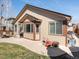 A home exterior shot of the patio, backyard, and windows, highlighting the outdoor living space and natural light at 5541 S Eaton St, Littleton, CO 80123