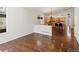 Spacious and open floor plan with lots of natural light connects kitchen to living room space at 5541 S Eaton St, Littleton, CO 80123