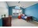 Well-lit bedroom featuring vaulted ceiling and large window at 6577 Esperanza Dr, Castle Pines, CO 80108