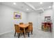 Bright game room with a small dining table, and a popcorn machine, perfect for Gathering fun at 6577 Esperanza Dr, Castle Pines, CO 80108