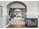 View from the bathroom into the spacious primary bedroom with ceiling fan at 6577 Esperanza Dr, Castle Pines, CO 80108