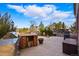 Outdoor cooking area with a grill and ample counter space, perfect for entertaining outdoors at 6577 Esperanza Dr, Castle Pines, CO 80108