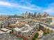 Aerial of city with ball park and mountain views at 2955 Inca St # 2Q, Denver, CO 80202