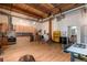 Open-concept living space with a modern kitchen and wood floors at 2955 Inca St # 2Q, Denver, CO 80202