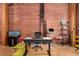 Bright living room with exposed brick, wood floors, and eclectic decor at 2955 Inca St # 2Q, Denver, CO 80202
