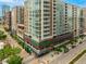 Desirable neighborhood view featuring modern apartments, restaurants, shops, and tree-lined sidewalks at 2955 Inca St # 2Q, Denver, CO 80202