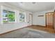 Inviting living room with hardwood floors, large windows, and open layout at 1742 S Forest St, Denver, CO 80222