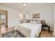 Bright bedroom with hardwood floors, a large window, and a stylish rug at 2822 S Zenobia St, Denver, CO 80236