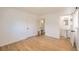 Inviting bedroom showcasing hardwood floors, ample closet space, and an ensuite bathroom with modern fixtures at 2822 S Zenobia St, Denver, CO 80236