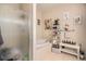 Clean and well-maintained bathroom with a glass shower, soaking tub, and modern decorative elements at 10818 Cimarron St # 1202, Firestone, CO 80504