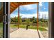 View from walkout basement with patio and fenced backyard and neighborhood beyond at 6265 S Ider Way, Aurora, CO 80016